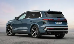 Niebieski Audi Q7 2026 z eleganckimi światłami LED i chromowanymi detalami, gotowy na nowe przygody.